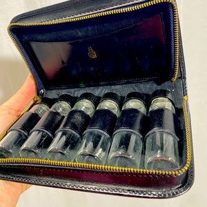 Mark Cross Vintage travel case with bottles